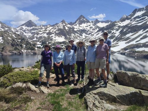 Our Valle de Tena Explorer group enjoying a beautiful day beside the lakes of Respomuso, with snow still on the surrounding peaks.